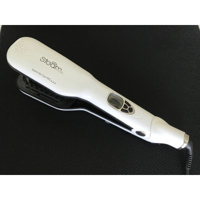 LCD hair straightening brush with spray